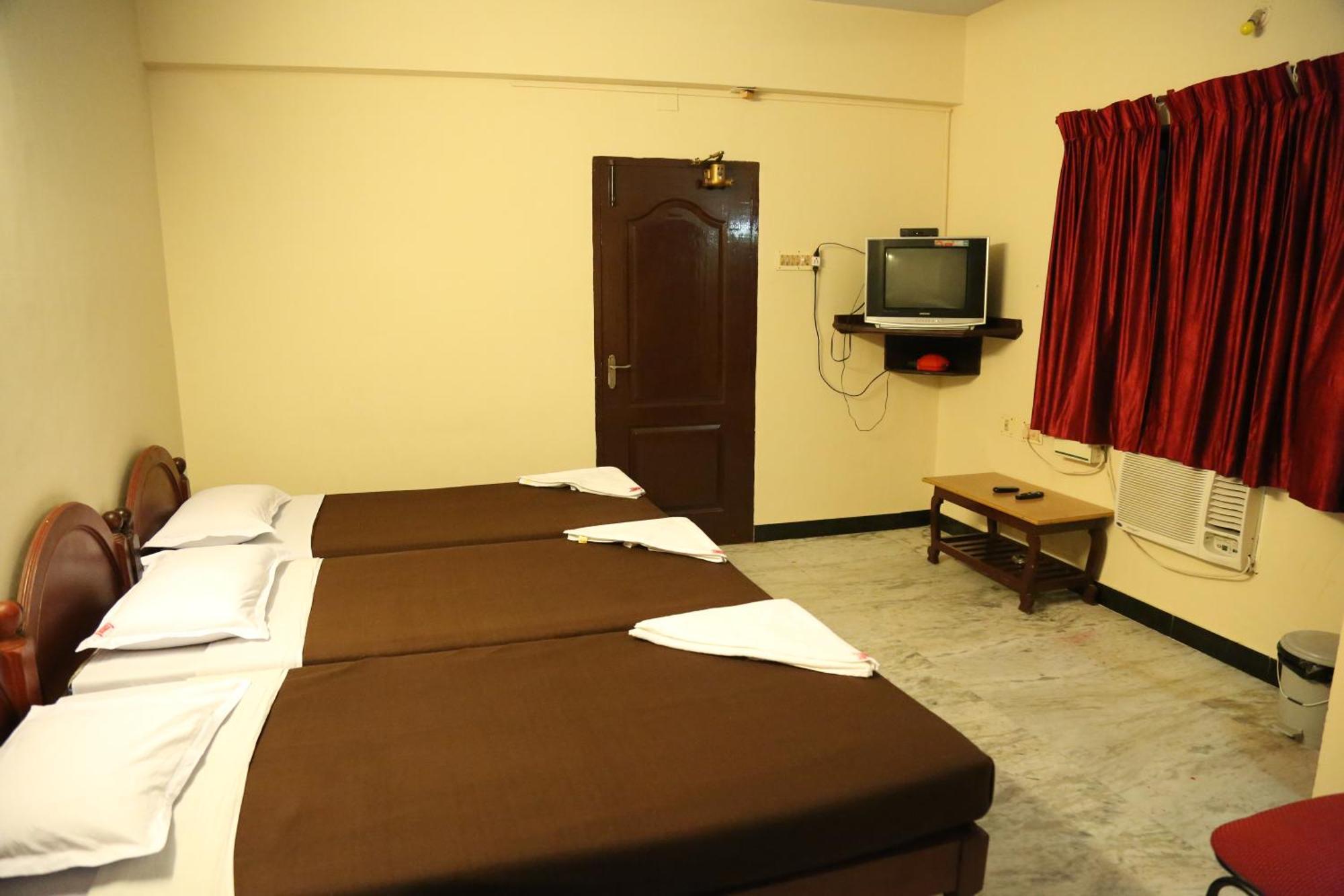 Rmc Travellers Inn Madrás Habitación foto