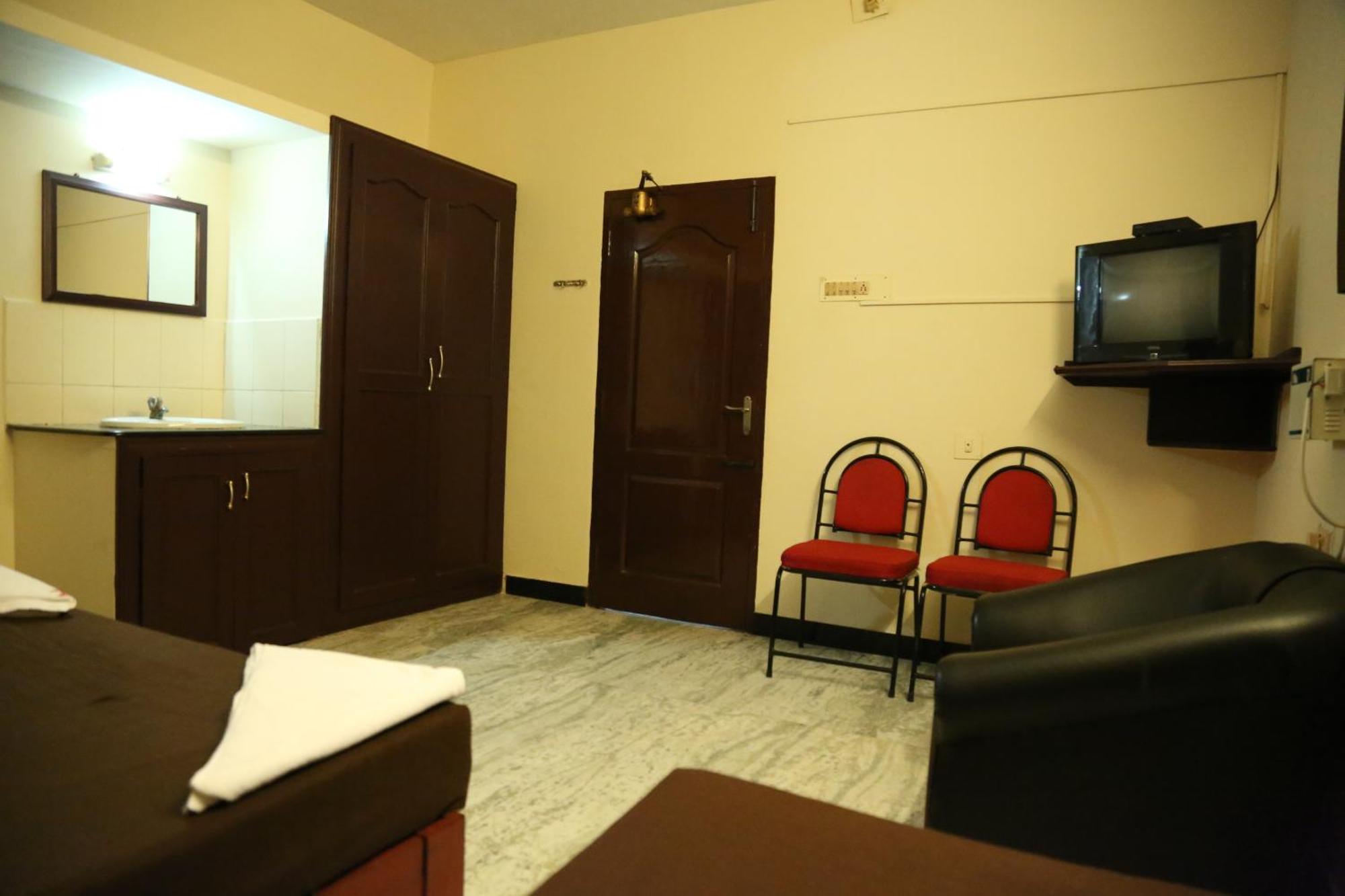 Rmc Travellers Inn Madrás Habitación foto